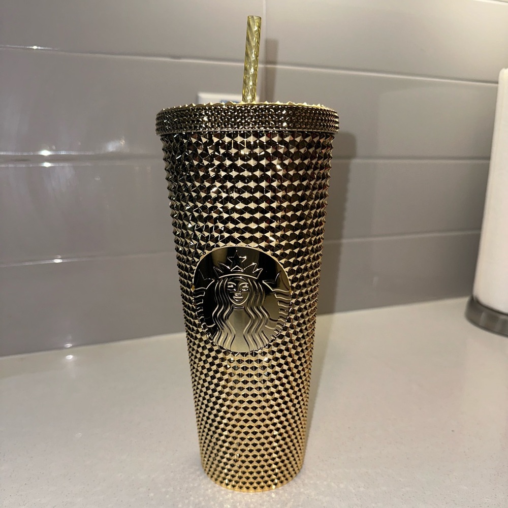 Venti size Starbucks tumbler in metallic gold